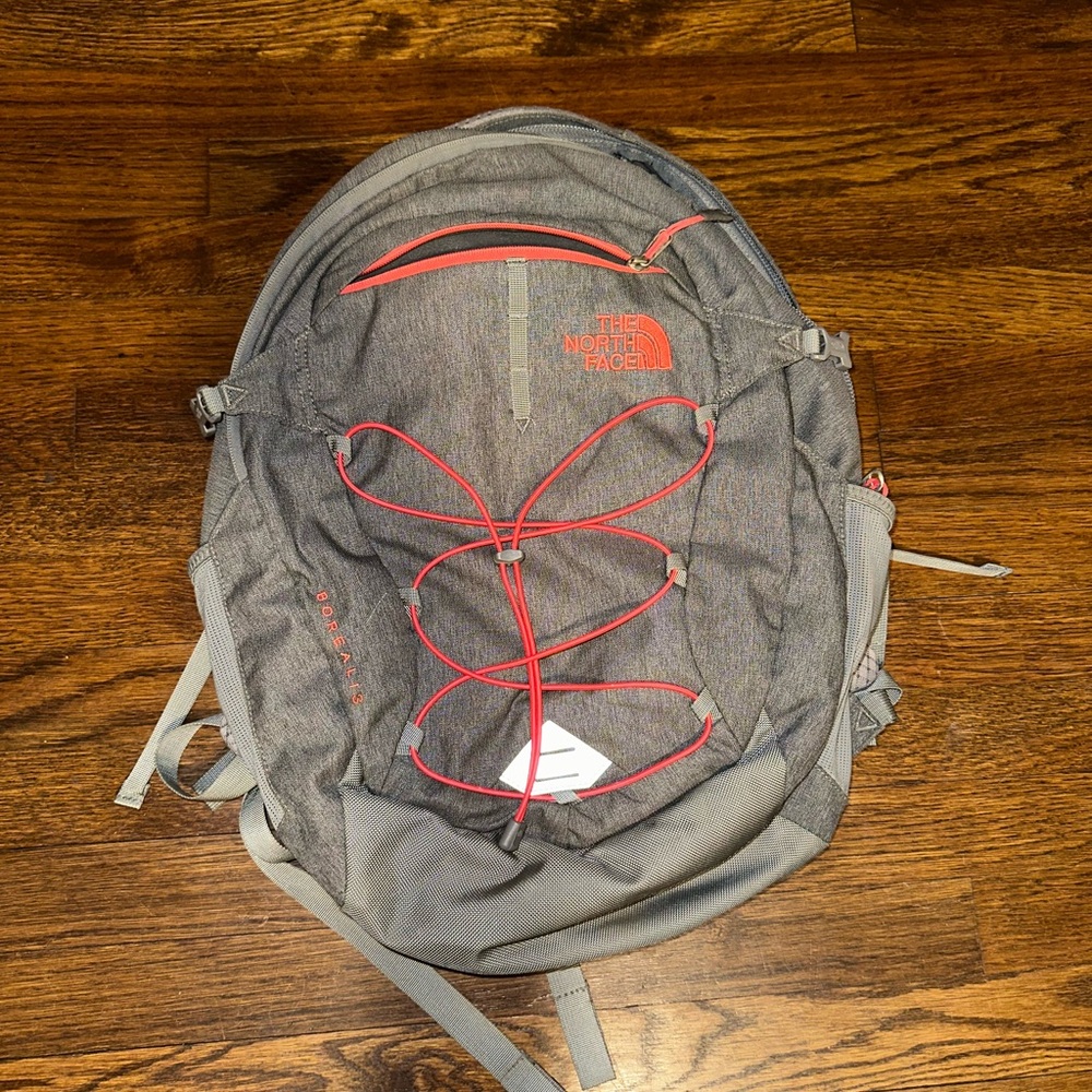 The North Face Gray and Red Backpack with Durable Design